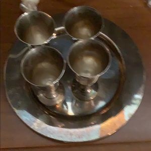4 silver shot glasses with silver tray